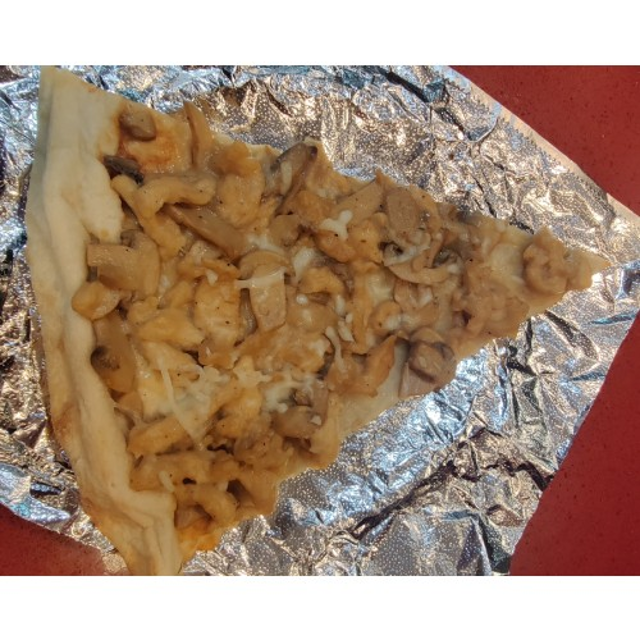 Chicken Marsala Pizza Slice.
